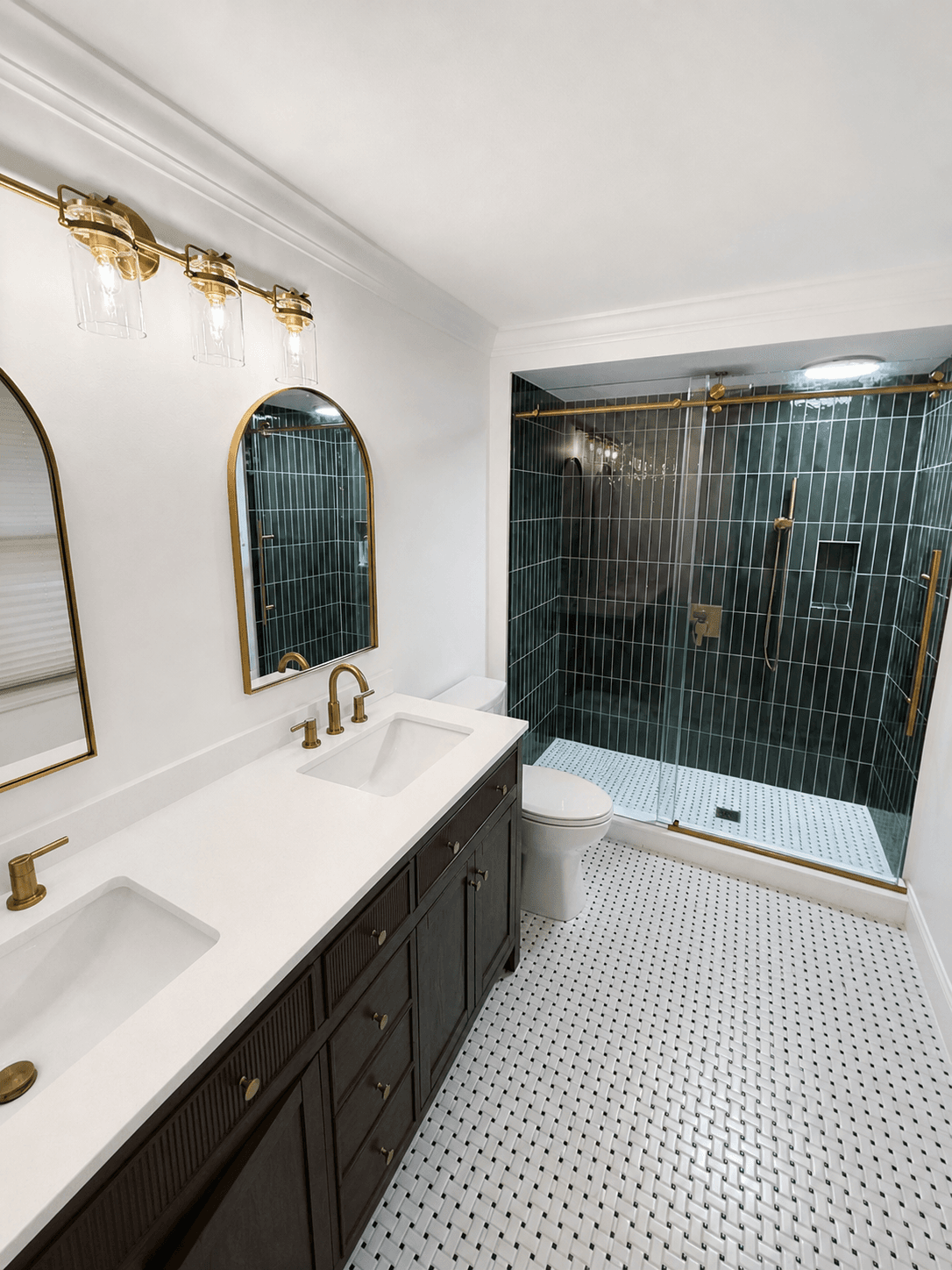 Completed DHR bathroom with a double vanity and green tiled shower
